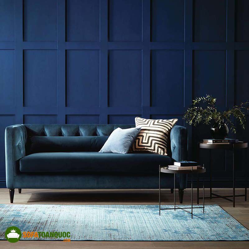 tường màu xanh chọn sofa màu xanh