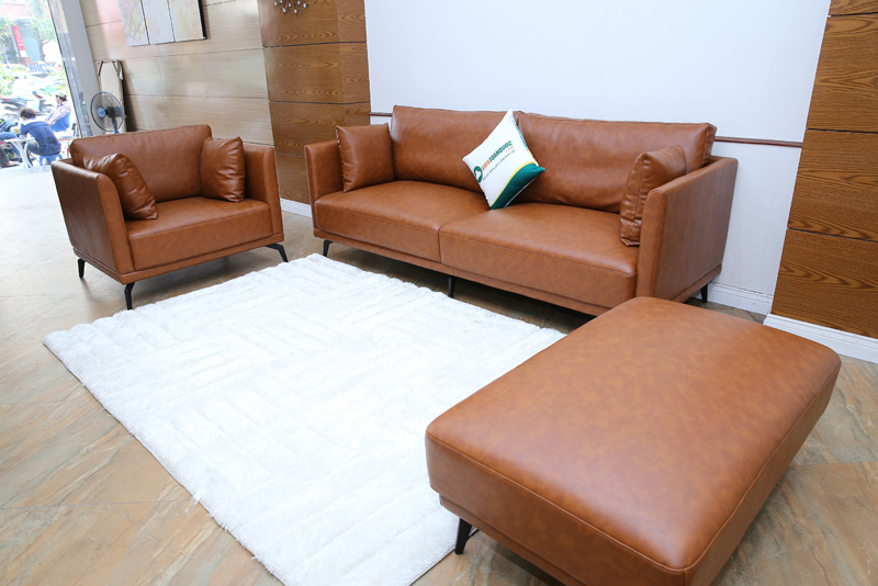 ghế sofa màu nâu sử dụng da công nghiệp